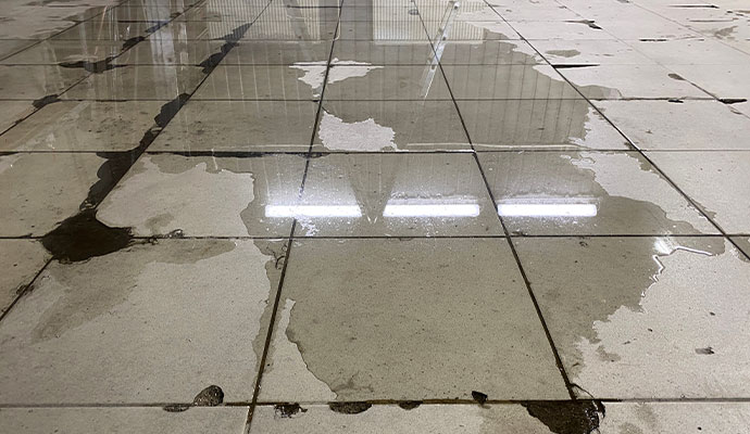 Water damaged tile floor Water damaged tile floor